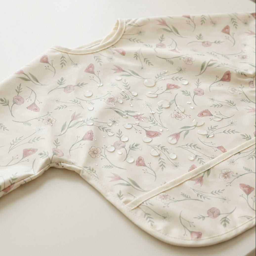 Bavoir à manches courtes fleuri imperméable 9 à 18 mois - Meyco Baby MEYCO BABY