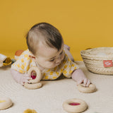 Donut jouet d’éveil sensoriel jaune – jouet en bois bébé PETIT BOOM