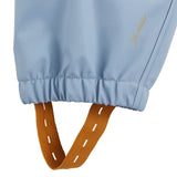 Pantalon de pluie enfant imperméable – salopette pluie unie Bleu pastel STERNTALER