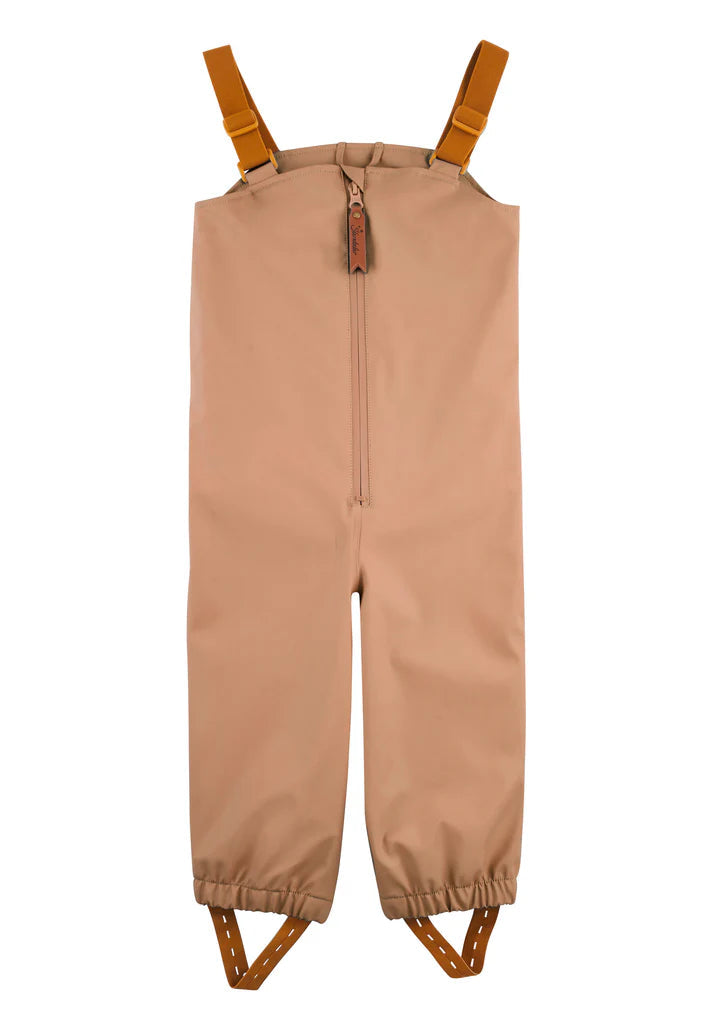 Pantalon de pluie enfant imperméable : l’allié idéal pour jouer dehors même sous la pluie. caramel