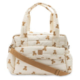 Sac à langer spacieux et déperlant avec tapis à langer nomade inclus. Pratique, élégant et idéal pour les sorties avec bébé.