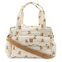 Sac à langer spacieux et déperlant avec tapis à langer nomade inclus. Pratique, élégant et idéal pour les sorties avec bébé.